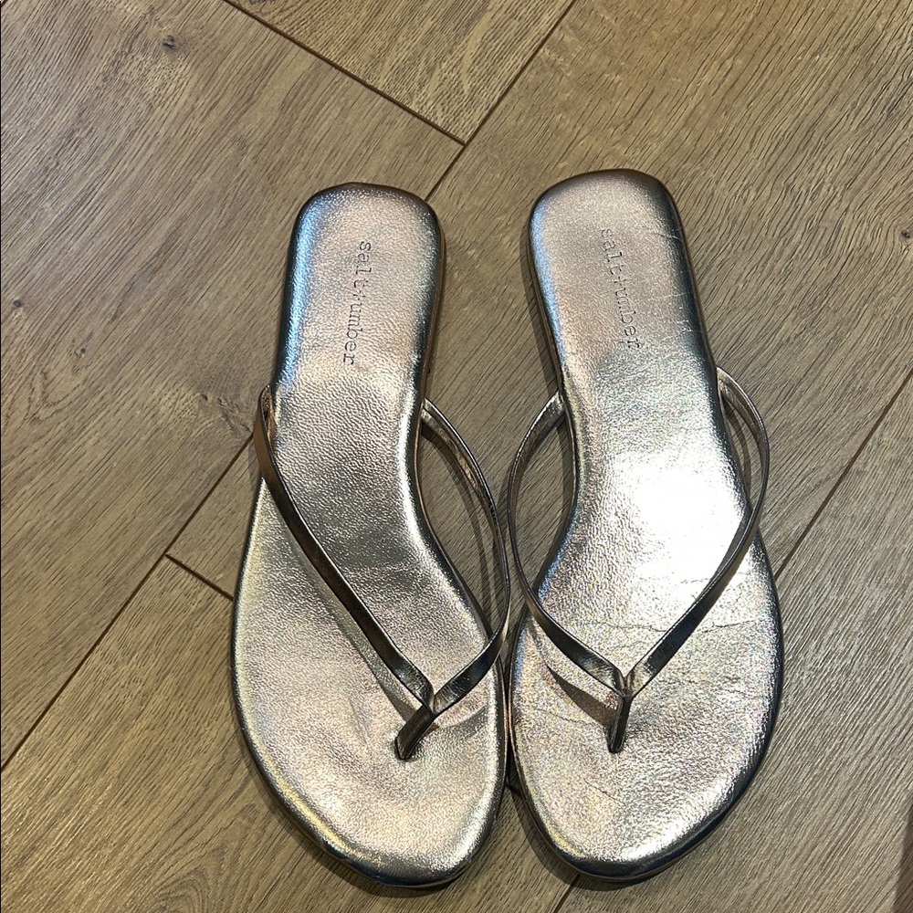 Salt + Umber metallic flip flops